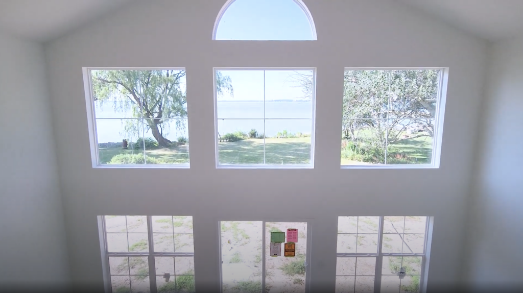 Great room floor to ceiling windows of the Wayne Homes Lynden.
