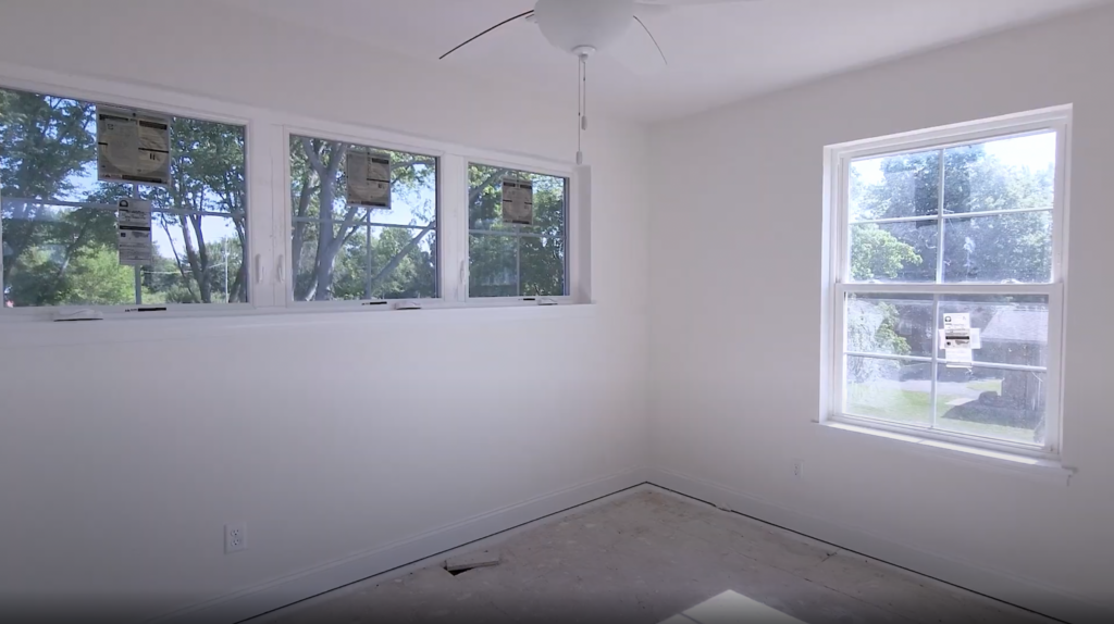 Bedrooms with windows and room for bunk beds or queen-sized beds.